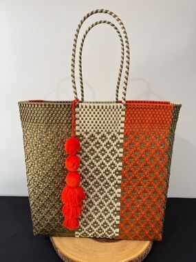 Artisanal Bag with Orange and golden Accents✨Made out of eco-friendly plastic.